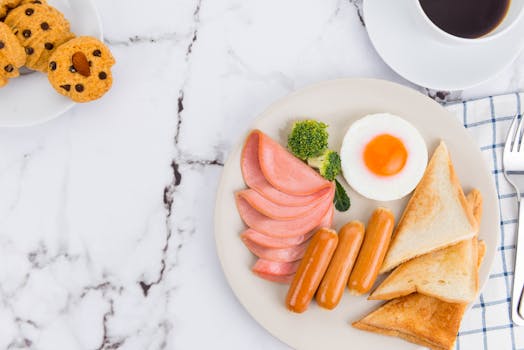 cooked breakfast sausages on a plate