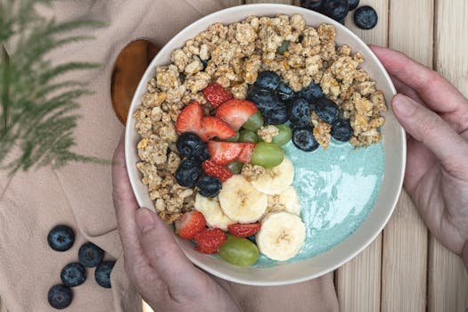 colorful smoothie bowl topped with fruits