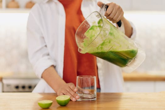 smoothie being poured into a glass