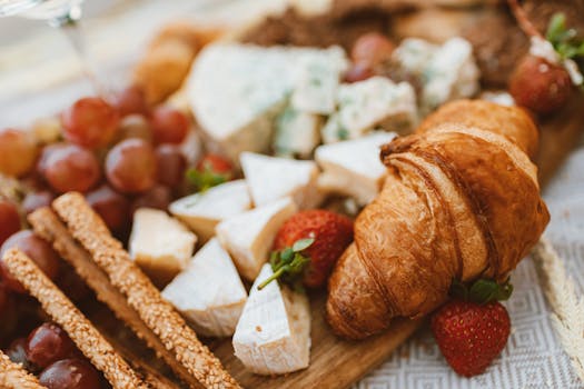 a spread of Mediterranean breakfast foods with fresh fruits and grains