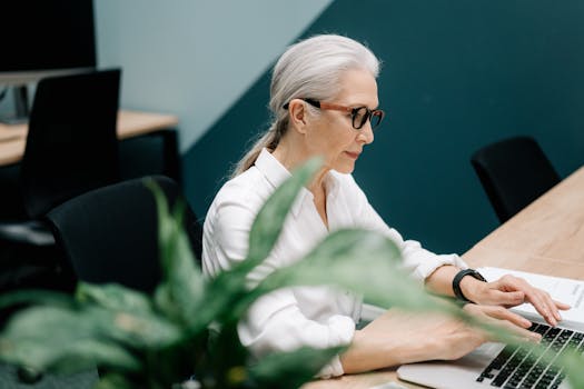 a busy professional enjoying a quick breakfast at a desk