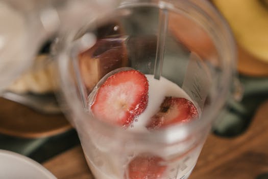 smoothie preparation with fresh ingredients